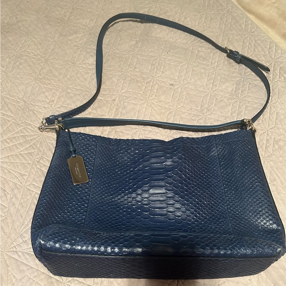 Coach NWOT purse. Zipper top. Hand carry or shoulder bag.